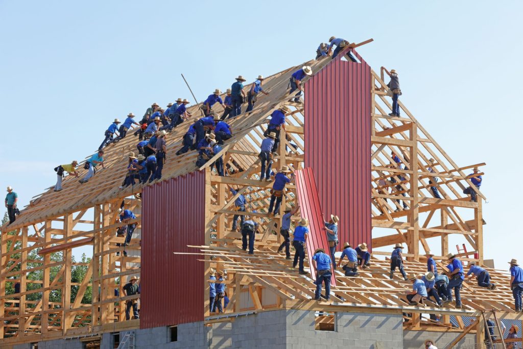 Maison ouvriers construction bois tôles charpentiers